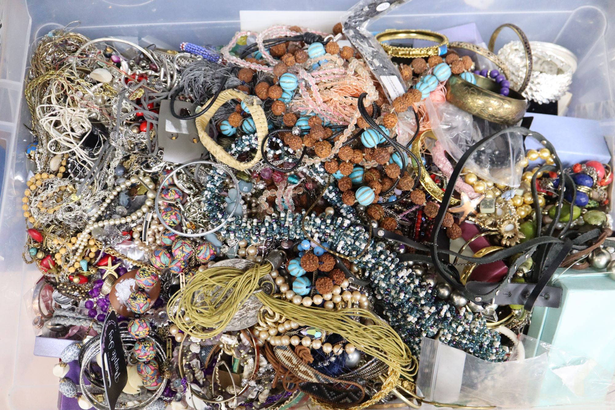 Two large boxes of assorted costume jewellery.